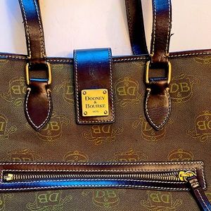 Vintage Dooney and Bourke canvas logo shoulder bag/ leather trim.